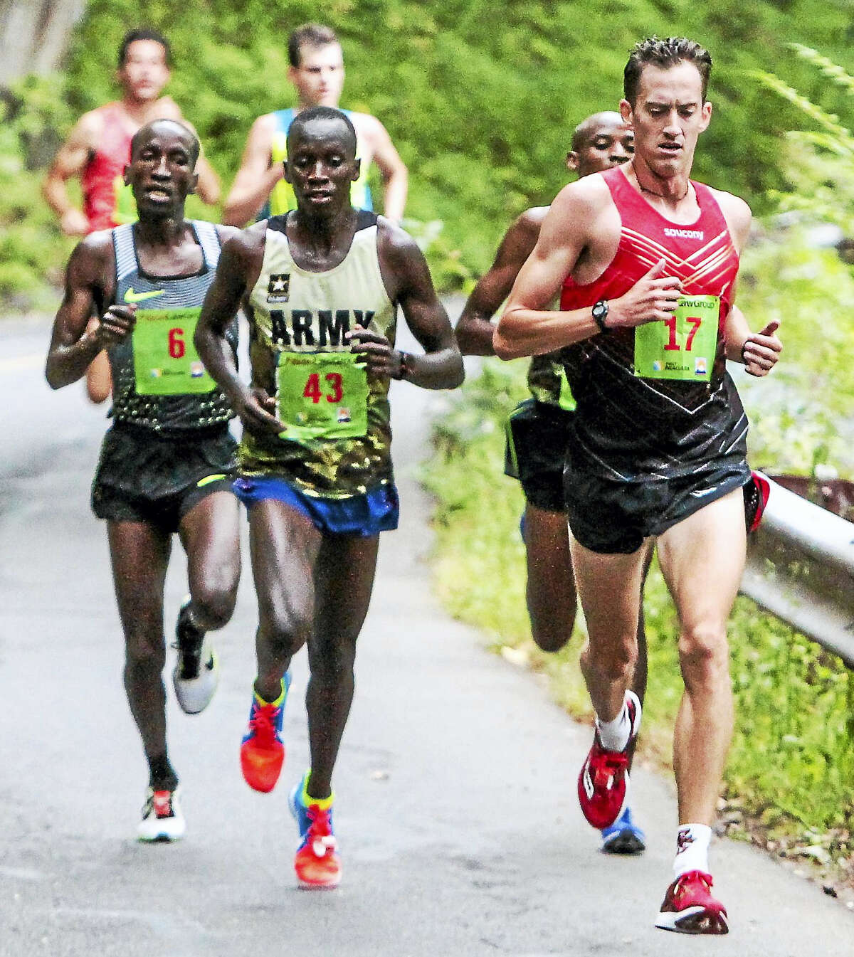 Men’s 20k winner Leonard Korir looks to take over the lead through the East Rock Park stretch during the 39th Annual New Haven Road Race 20K Championship Monday, September 5, 2016.