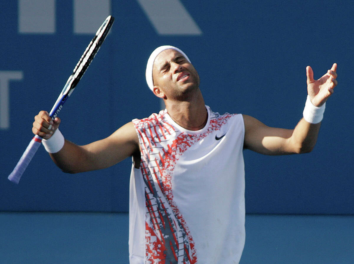American James Blake reacts to a lost point in his first round match against France's Fabrice Santoro at the Sydney International tennis in Sydney, Australia, Monday, Jan. 7, 2008. Santoro won the match 7-6, 6-2 knocking out the defending men's champion.