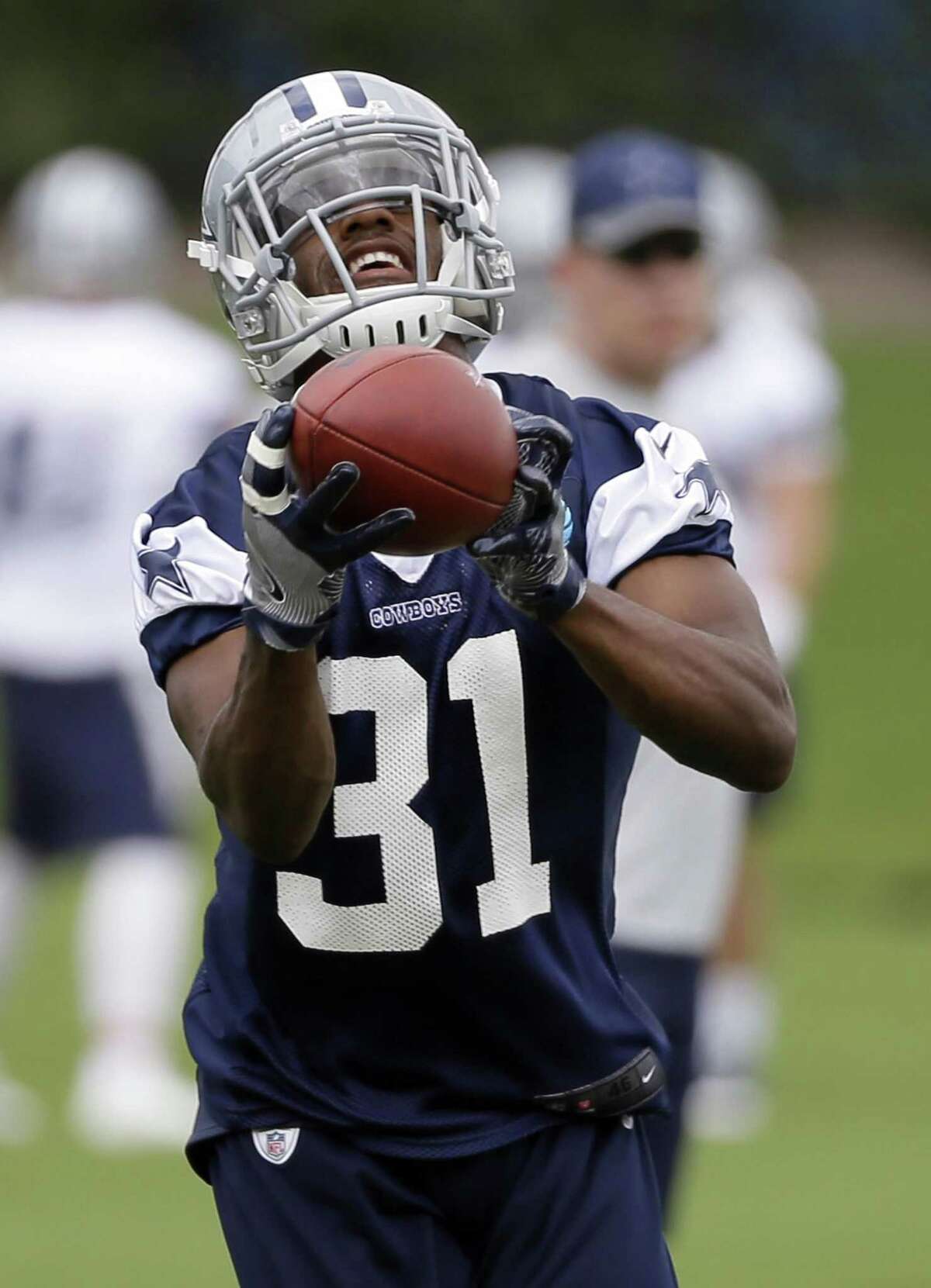 Cowboys safety snags praise with camp interceptions