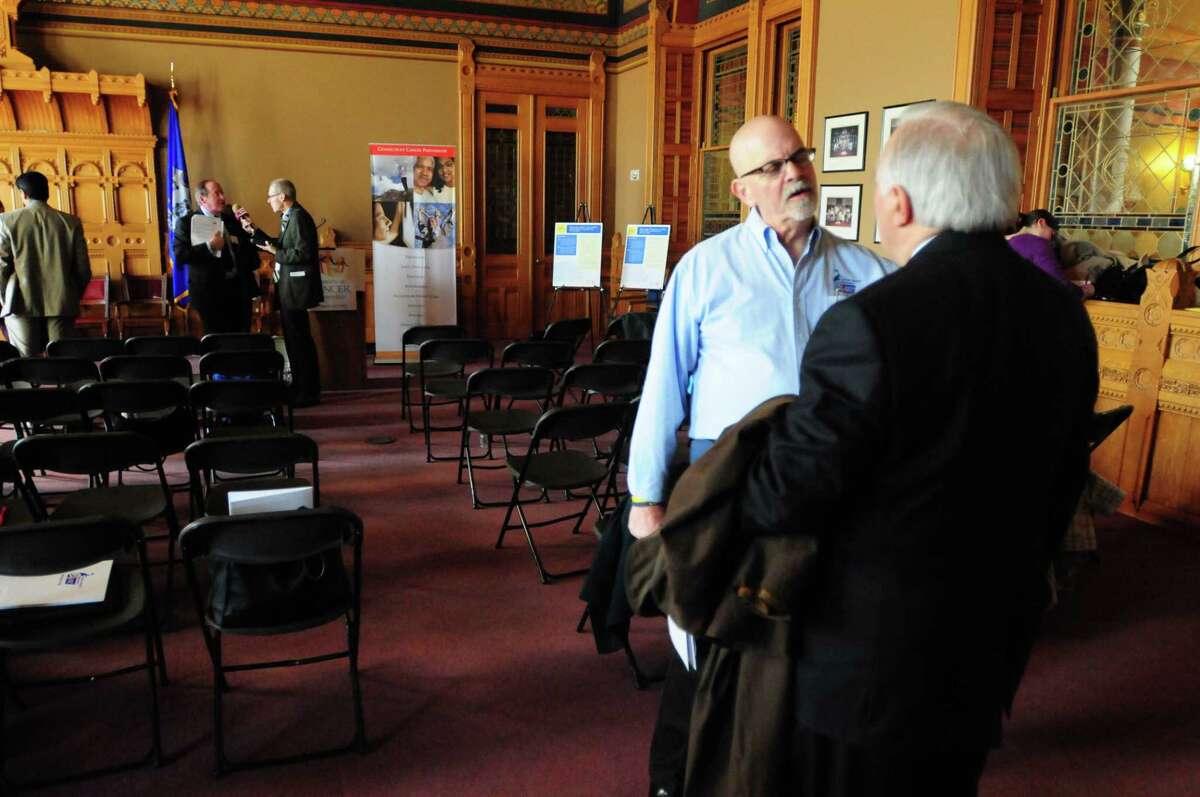 (Peter Hvizdak - New Haven Register) David Koch in the old Judiciary Room at the Capitol in Hartford. Koch of Hamden, a 17-year volunteer with the American Cancer Society Cancer Action Network (ACS CAN), a non-Hodgkins Lymphoma cancer survivor who, along with approximately 100 other cancer patients, survivors and caregivers from around the state, are in Hartford Tuesday, April 1, 2014 to lobby Connecticut lawmakers about the need to make cancer issues a top priority in the legislature. The visit is part of the annual American Cancer Society Cancer Action Network Lobby Day.