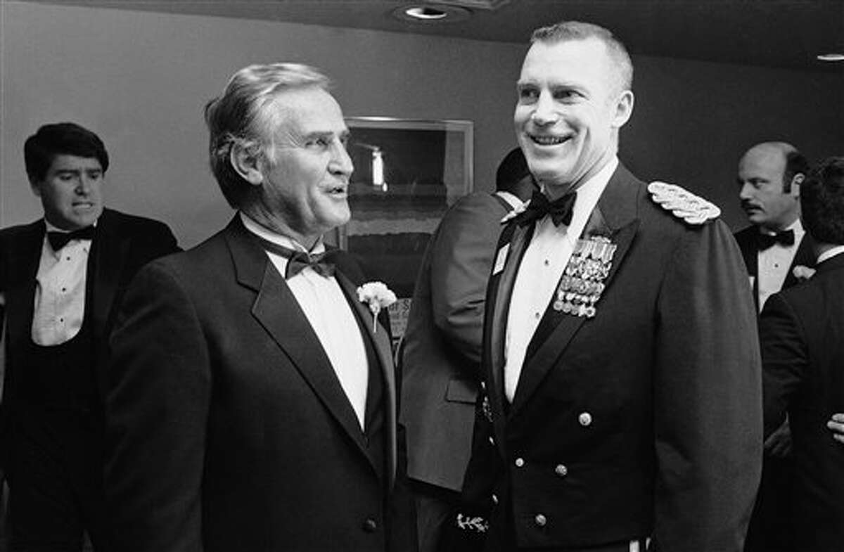 Miami Dolphins? coach Don Shula, left, and Maj. Gen. William Carpenter, right, talk together before the start of the Walter Camp Football Foundation awards dinner in New Haven on Saturday, Feb. 2, 1985. Shula was named Man-of-the-Year by the group and Gen. Carpenter, a former football star at West Point and military hero received the group?s Distinguished American award. (AP Photo/Bob Child)