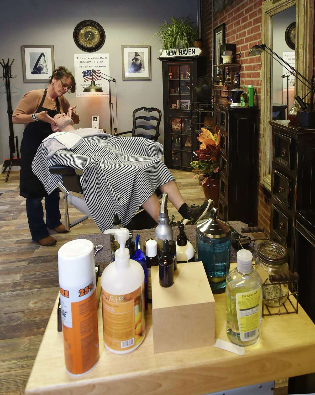Female barber opens shave shop in Milford for the ‘guy in your life’