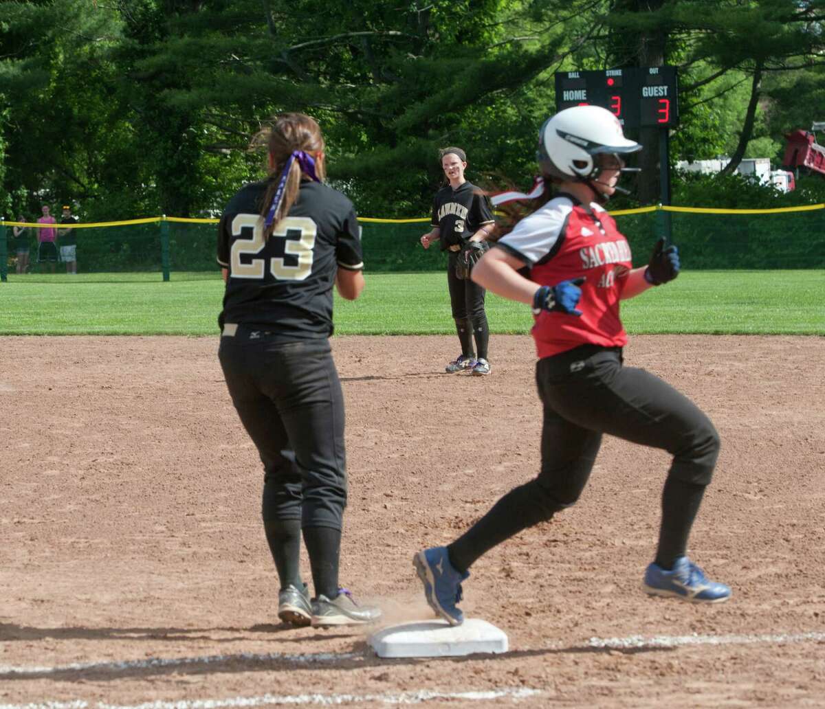 Photos of Sacred Heart vs Jonathan Law Softball Quarterfinals