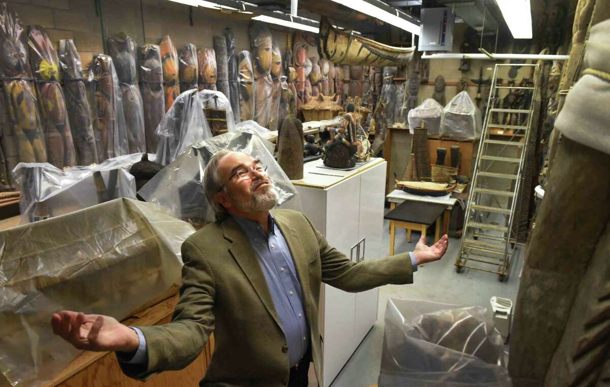 (Peter Hvizdak - New Haven Register) Author Richard Conniff of Old Lyme, who authored the book "House of Lost Worlds" about the history of the Yale Peabody Museum of Natural History and the people that made it a great museum shares his excitement about the many stories it holds while standing in the inner sanctum of Anthropological Collection Storage Room in the museum's basement, Wednesday morning, March 23, 2016. The book celebrates the museum's 150th anniversary. A 150th Anniversary celebration exhibit will open April, 2. 2016. Wednesday, March 23, 2016.