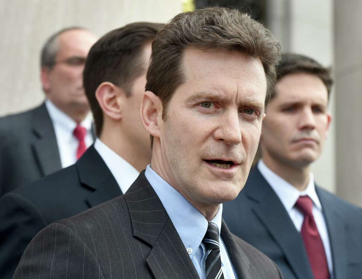 (Peter Hvizdak - New Haven Register) First Assistant U.S. Attorney Michael J. Gustafson speaks to the press outside of Federal Court in New Haven Tuesday, March 24, 2015 after former Congressional candidate Lisa Wilson-Foley was sentenced to 10-months suspended after 5-months for hiding a campaign consulting relationship with former Governor John Rowland.