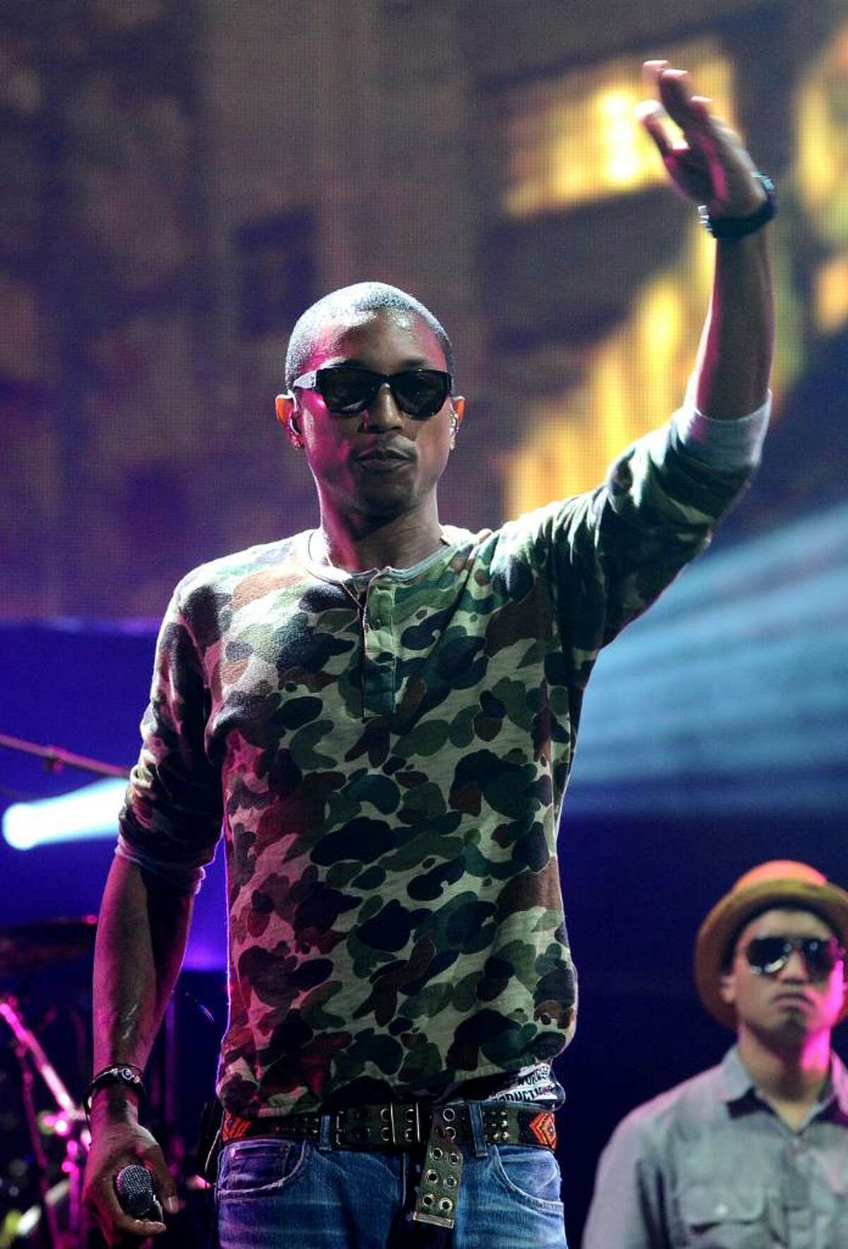 LOS ANGELES, CA - JUNE 14: Pharrell Williams of N.E.R.D performs onstage at the Activision E3 2010 preview held at Staples Center on June 14, 2010 in Los Angeles, California. (Photo by Michael Buckner/Getty Images for Activision) *** Local Caption *** Pharrell Williams