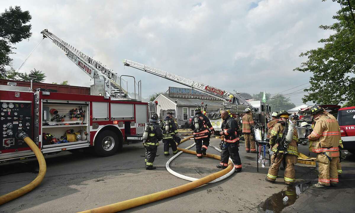 Milford firefighters battle ‘stubborn’ blaze in scrap yard