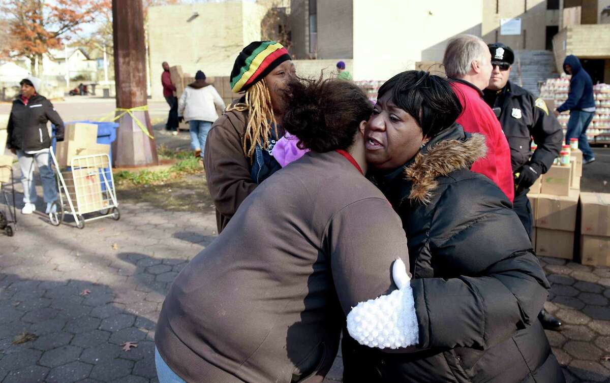 PHOTOS of Needy Families Receive Food in New Haven