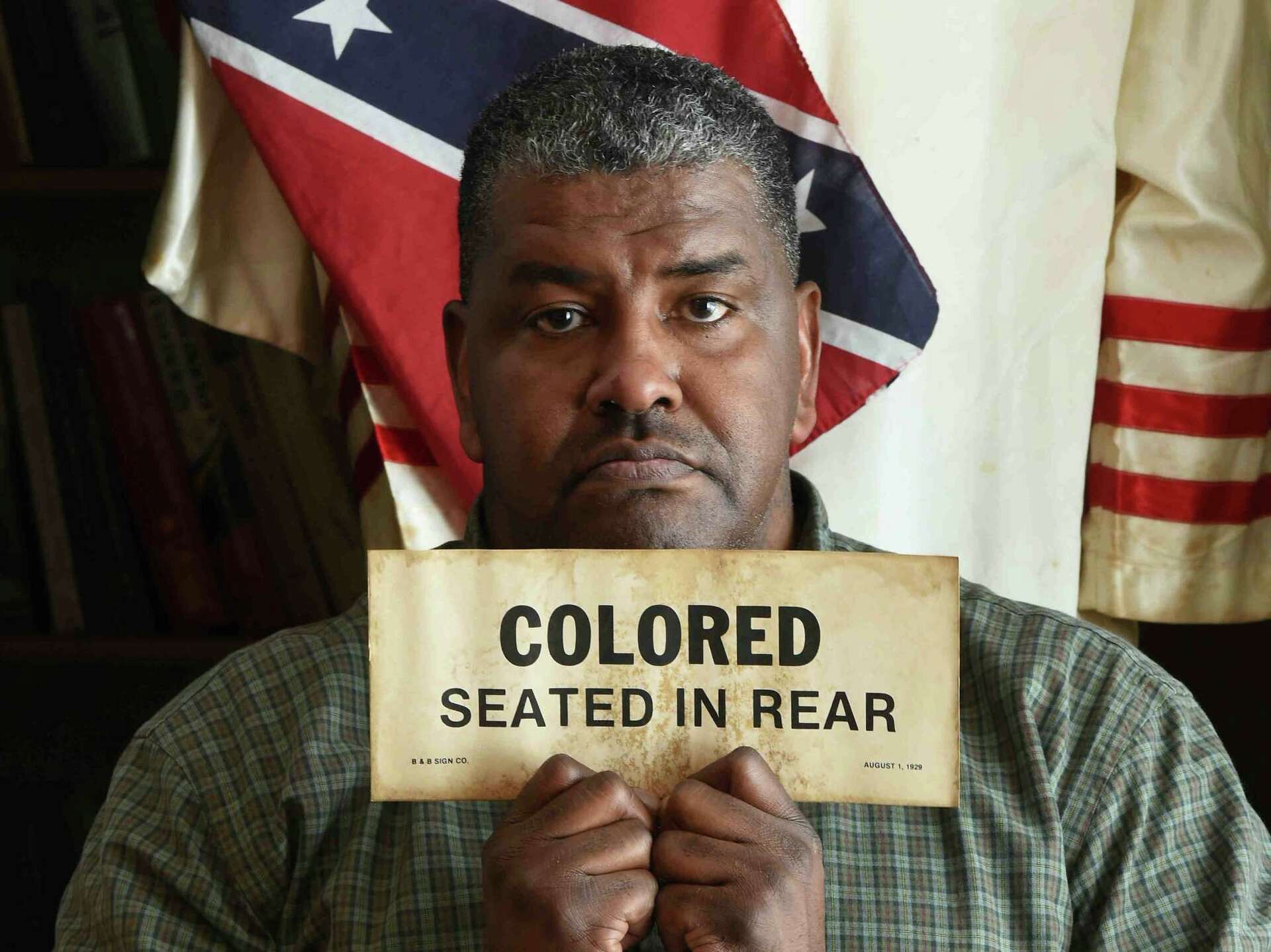 KKK hood among items at retired New Haven cop's new African