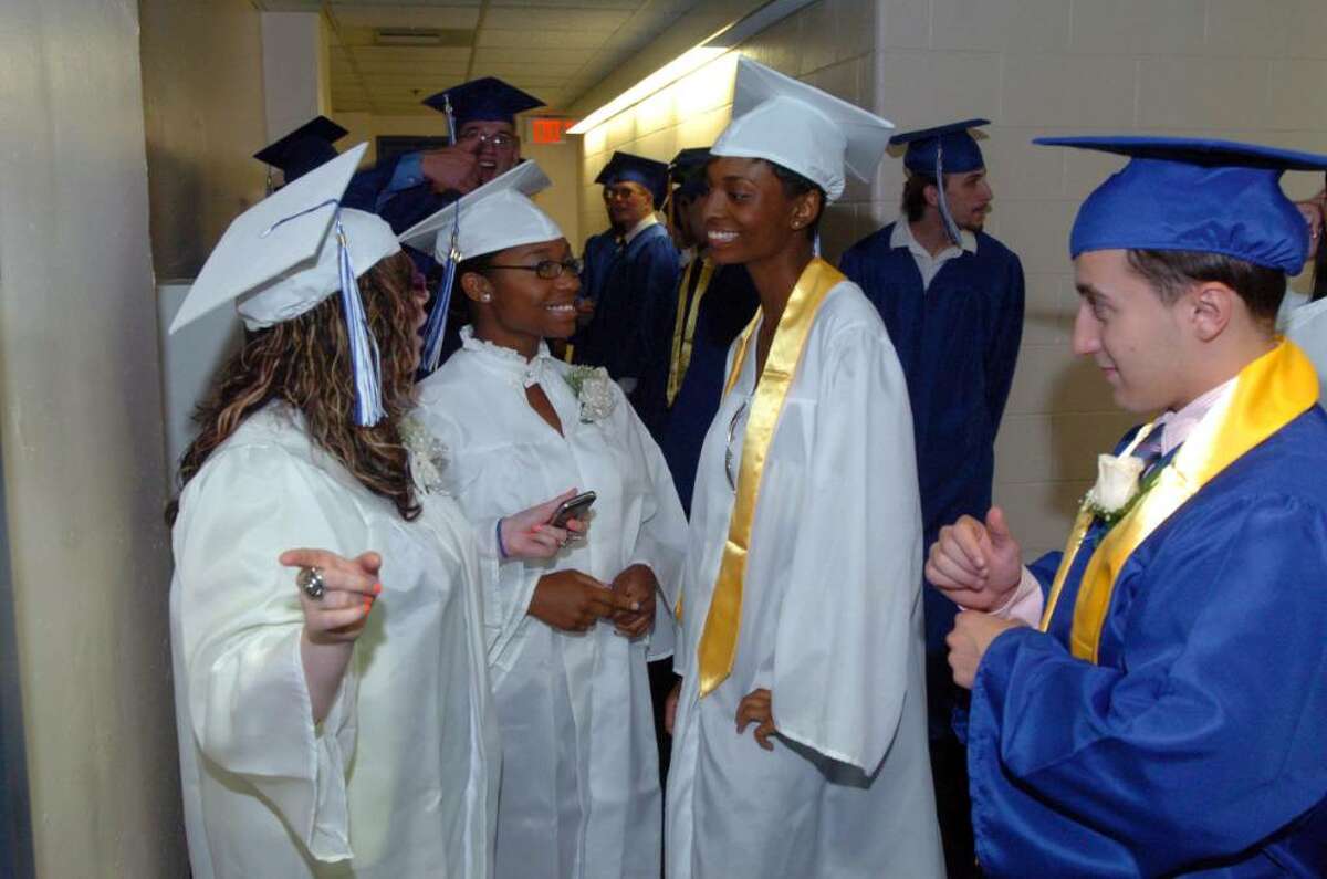 Students and family attend the Henry Abbott Technical High School graduation at the O'Neill Center on Western Connecticut State University's campus in Danbury, June 15, 2010.