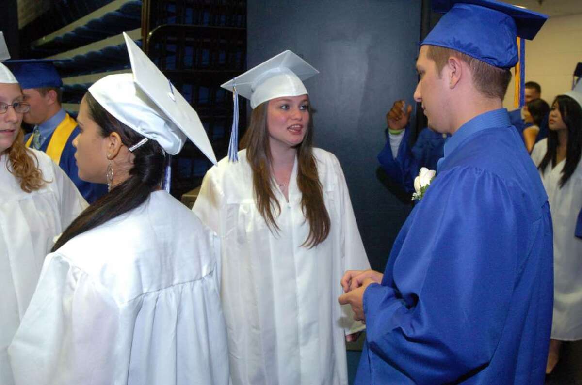 Students and family attend the Henry Abbott Technical High School graduation at the O'Neill Center on Western Connecticut State University's campus in Danbury, June 15, 2010.