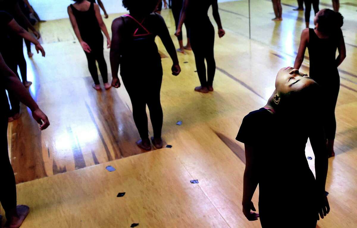 (Peter Hvizdak - New Haven Register) The Tia Russell Dance Studio Summer Day Camp of approximately 40 students, 5 - 12 years, rehearsed their repertoire of ballet, jazz, west african and hip-hop dance at the Woodbridge, Connecticut dance school Tuesday, August 4, 2015, preparing for a summer dance presentation at the ACES Educational Center for the Arts on Audubon Street in New Haven Saturday, August 8, 2015 at 5:30 p.m. 100 percent of the proceeds will go to charity. The summer dance performance camp runs for 5-weeks.