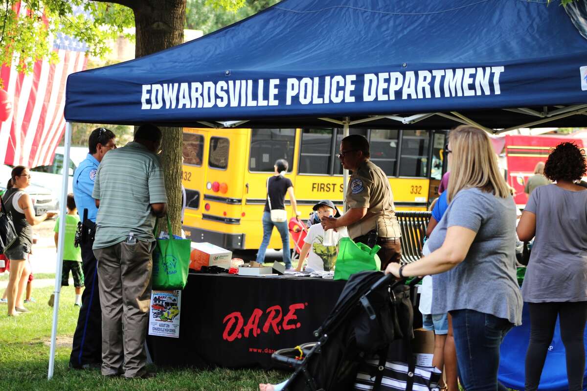 The Edwardsville Police Department hosted National Night Out at 5:30 p.m., Tuesday, August 1st at City Park. The event is put on every year in hopes to promote positive relationships between the public and local first responders. The National Guard, the Edwardsville Fire Department, Edwardsville Parks and Recreation, the YMCA and various other organizations were also in attendance. The festivities included free snow cones, face painting, free food and drinks, large inflatables, craft tables for children and more.
