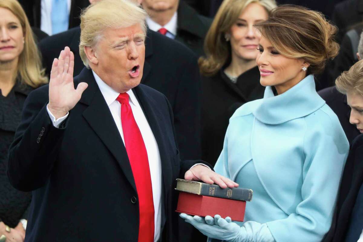 Donald Trump is sworn in as the 45th president of the United States as Melania Trump looks on during the 58th Presidential Inauguration at the U.S. Capitol in Washington, Friday, Jan. 20, 2017.