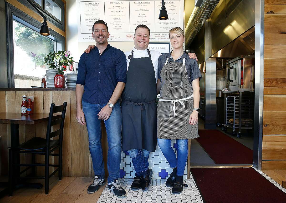 FILE-- Partners Johnny Gilbert (left), Evan Rich (middle), and Sarah Rich at the original RT Rotisserie.