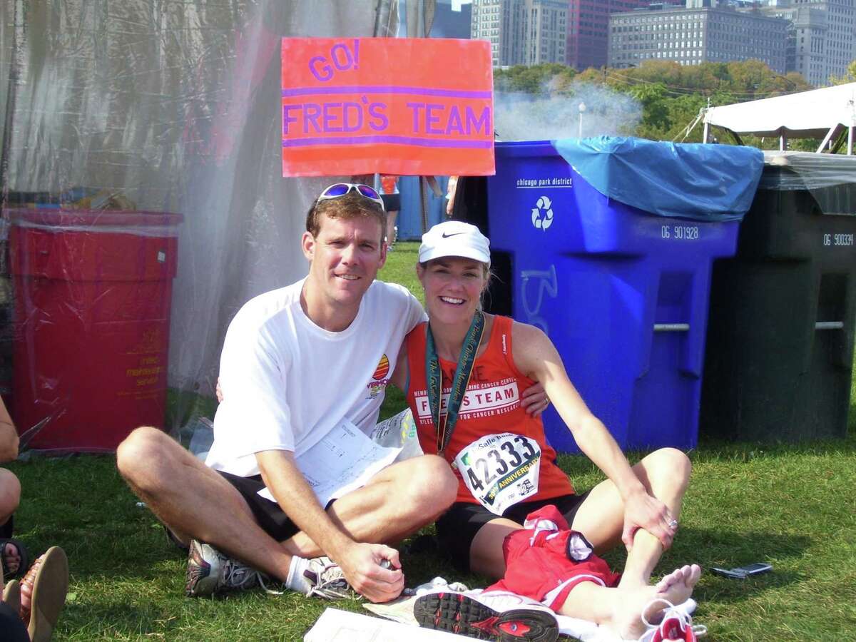 Anne Waldron and husband John pose after the Chicago Marathon in 2007.
