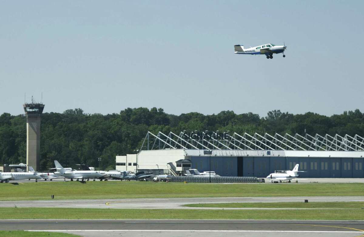 A small plane departs Westchester County Airport in White Plains, N.Y. Tuesday. The airport’s master plan calls for more than $450 million worth of expansions, including new parking garages, a corporate jet hanger and a building for U.S. Customs and county police.