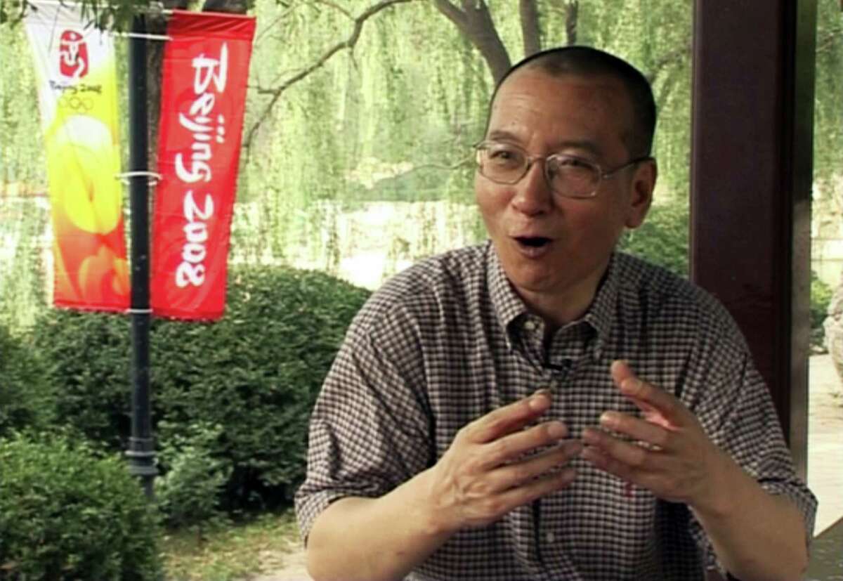 AP Video image via Associated press Liu Xiaobo speaks during an interview at a park in Beijing, China.