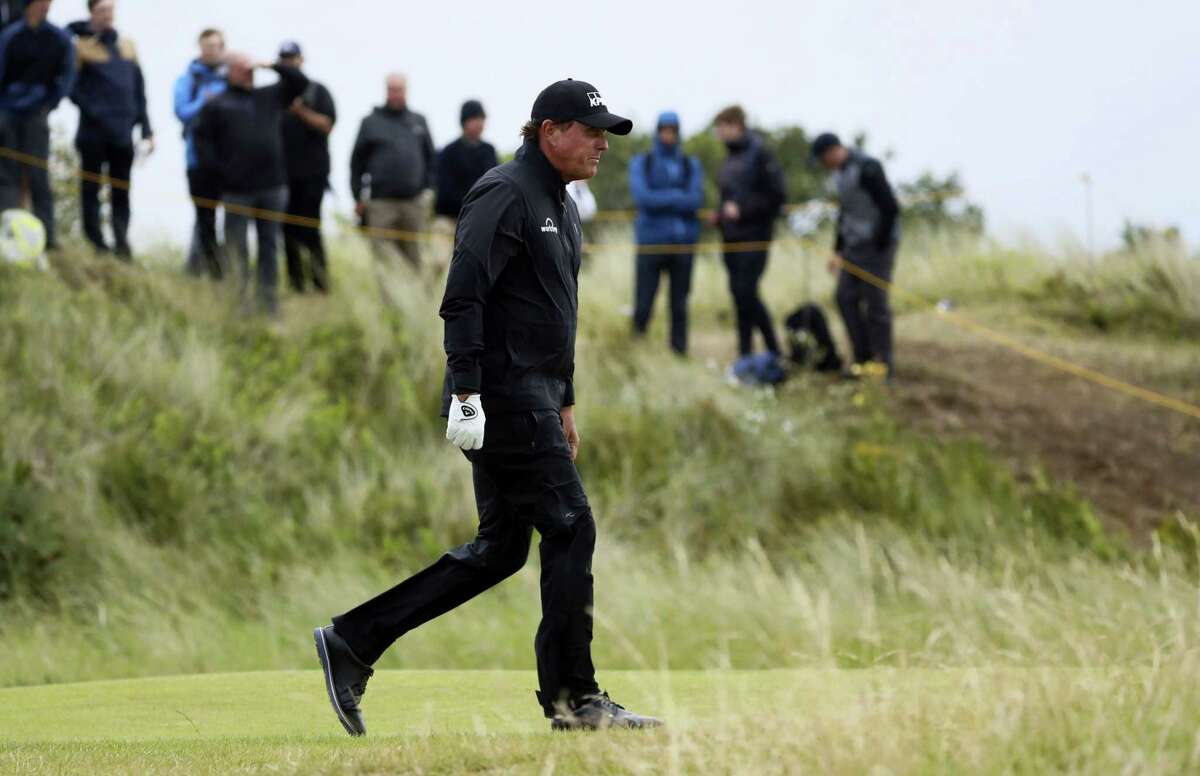 Phil Mickelson walks along the 10th fairway during the second round of the British Open.