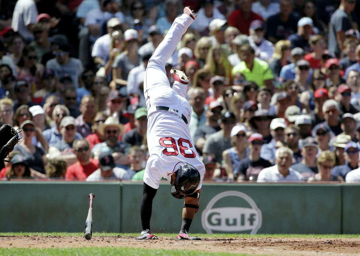 Eduardo Nunez stands on his hands after being hit by a pitch in the third inning.