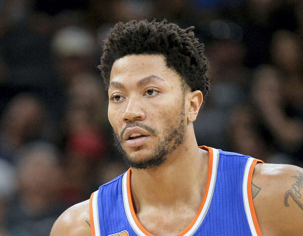In this March 25, 2017 photo, New York Knicks’ Derrick Rose stands on the court during a free throw attempt in the first half of an NBA basketball game against the San Antonio Spurs, in San Antonio. A person familiar with the negotiations says the Cleveland Cavaliers are discussing a contract with former NBA MVP Derrick Rose. The team is discussing a one-year deal with Rose, said the person who spoke Thursday, July 20, 2017, to the Associated Press on condition of anonymity because of the sensitive nature of the talks.