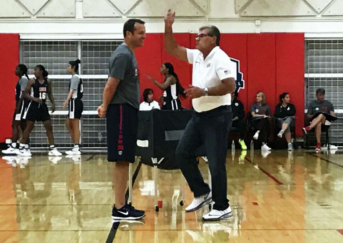 UConn head coach Geno Auriemma, right, and Louisville head coach Jeff Walz talk during the US Under-23 training camp in Colorado Springs, Colo. on Monday.