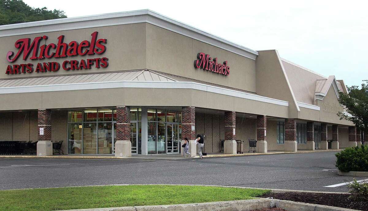 Customers walk into the Michaels Arts and Crafts store in the Candlewood Plaza Shopping Center in Brookfield, Conn., on Wednesday, Aug. 2, 2017. Michaels moved to the space next door in the plaza and CVS will take over the corner spot.