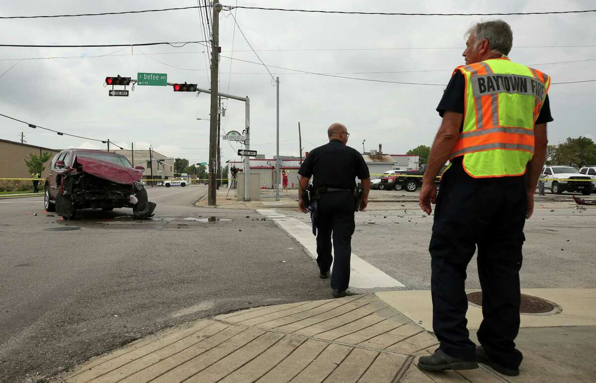 First responders injured when Baytown ambulance rolls over in Tbone crash