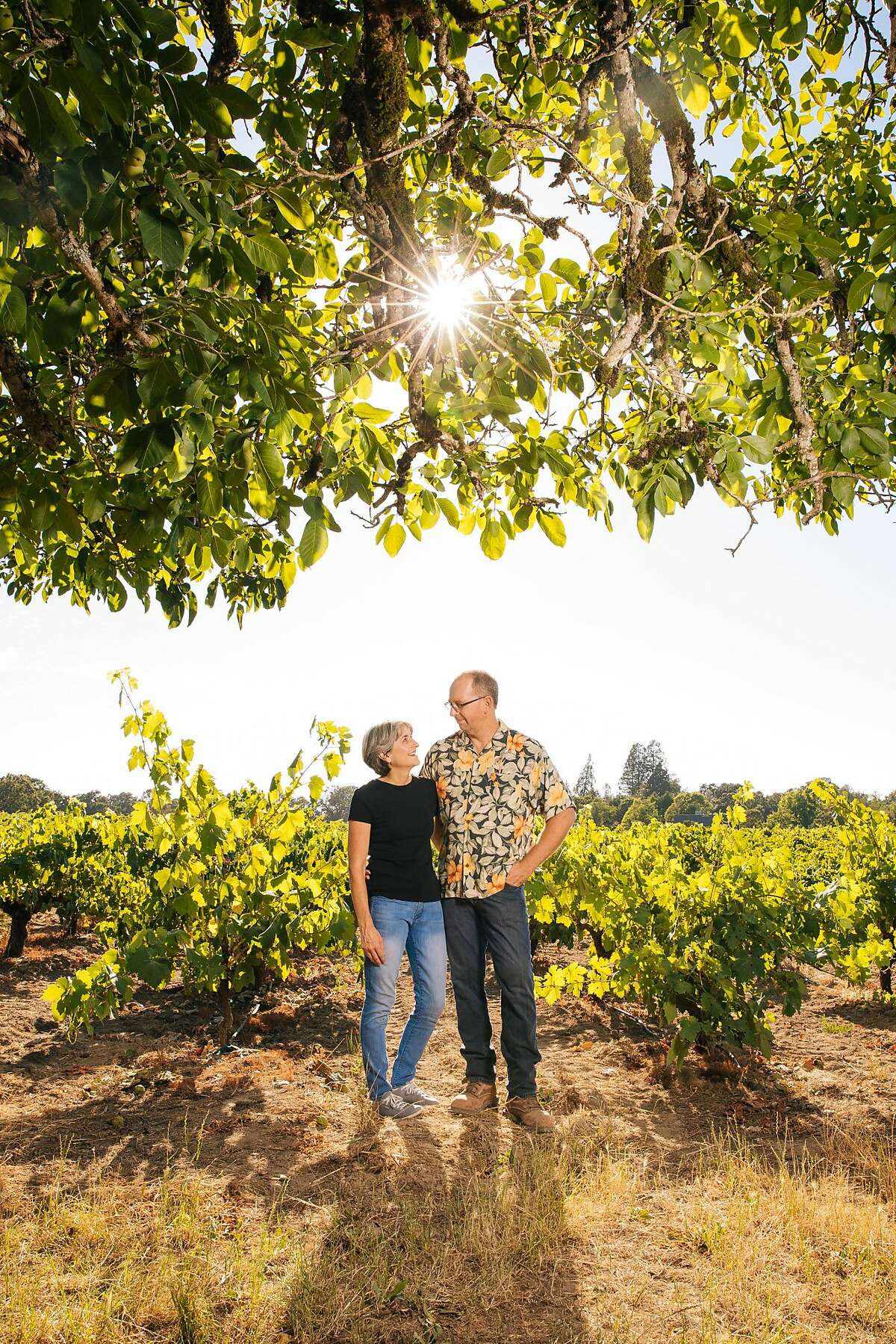 Mike Officer and Kendall Officer, owners of the Carlisle Winery and Vineyard, photographed in the Carlisle Vineyard in Windsor, Calif. Saturday, July 22, 2017.