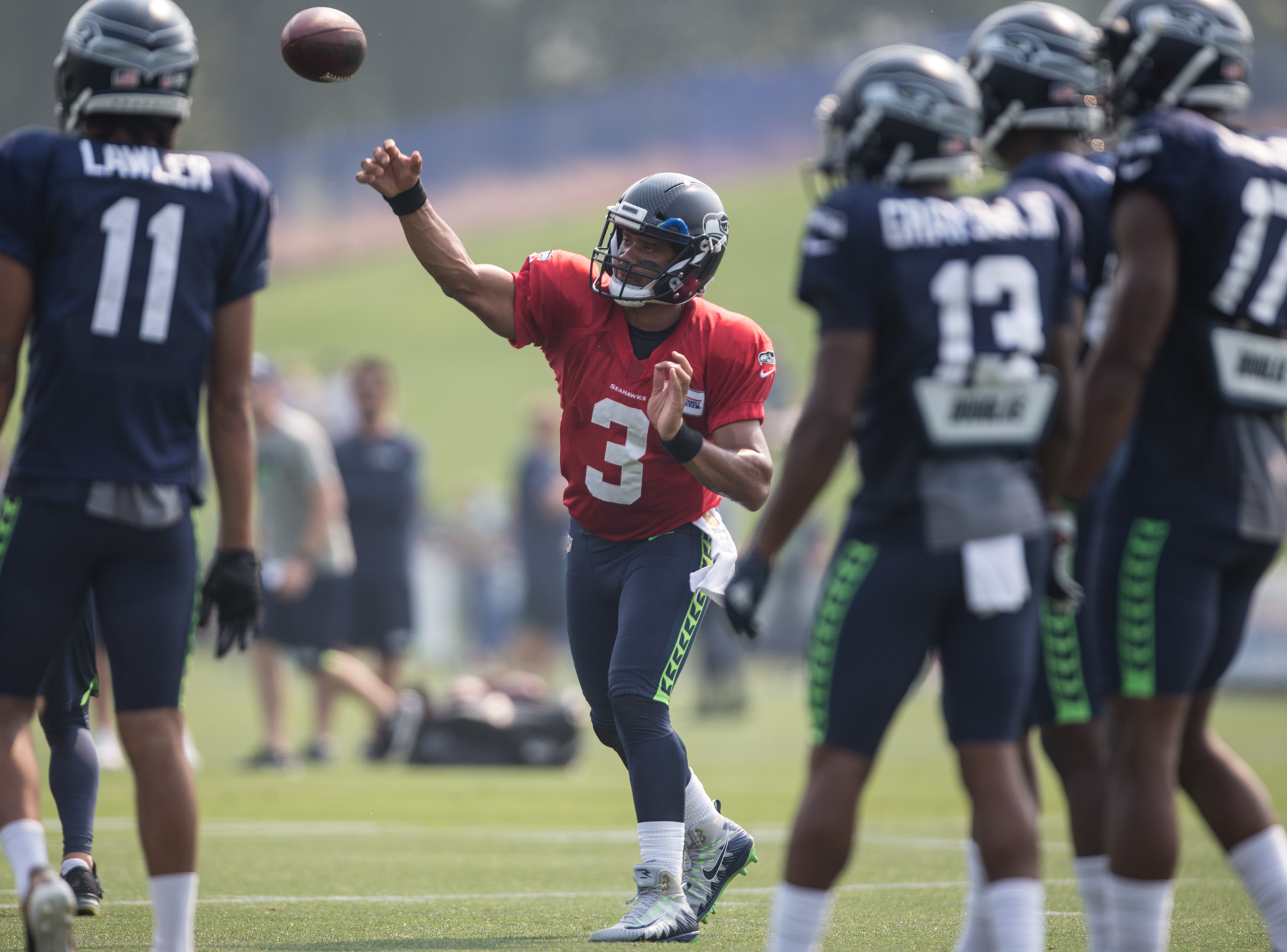 Wear Russell Wilson jersey, board Alaska Air flights early