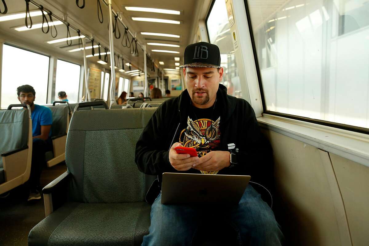 Ben Friedland rides BART from the Fremont station to his work in San Francisco on Wed. August 2, 2017, in Fremont, Ca. Friedland created bartcrimes.com. Friedland, a software engineer used two round trips to write the code that scrapes BART's crime logs and publishes the information on the website he launched on July 18.