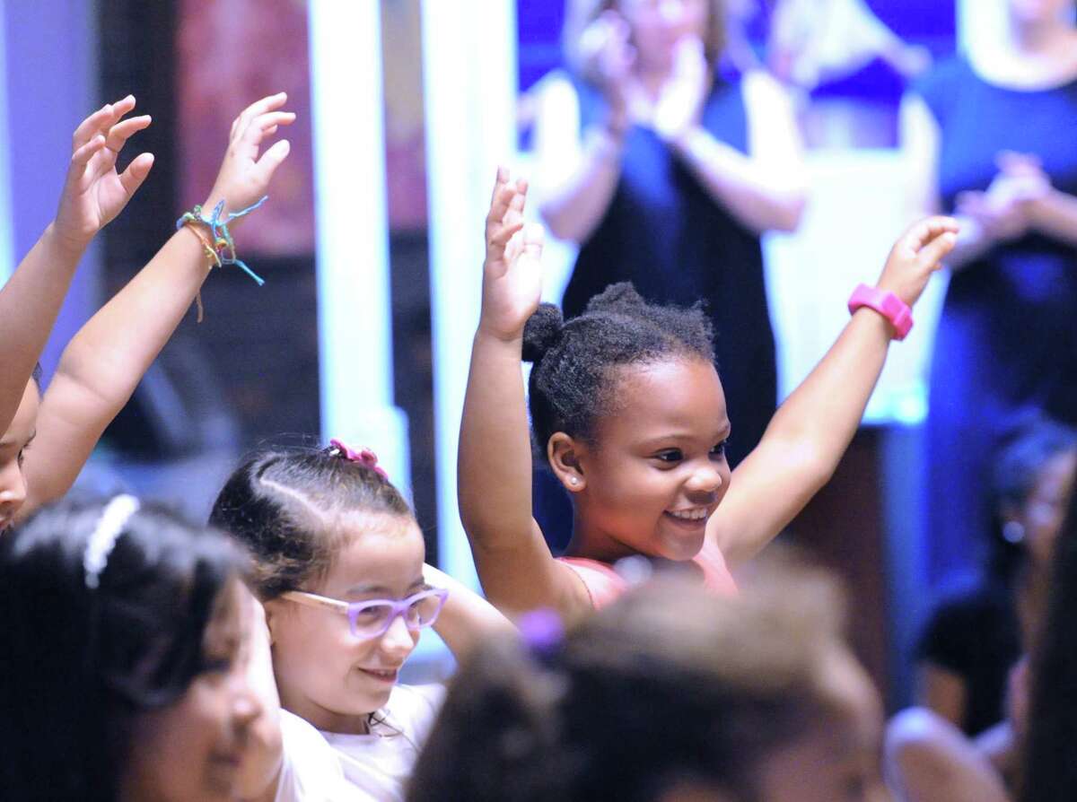 Saide Lancaster, 8, at right, during the Greenwich Academy Talent Enrichment summer camp farewell dance performance at the school located in Greenwich, Conn., Friday morning, Aug. 4, 2017. The GATE camp has been held for the past 29 summers at the all-girls private school and gives public school female students from Greenwich, Stamford and Port Chester, N.Y., an opportunity to experience a Greenwich Academy education for free.