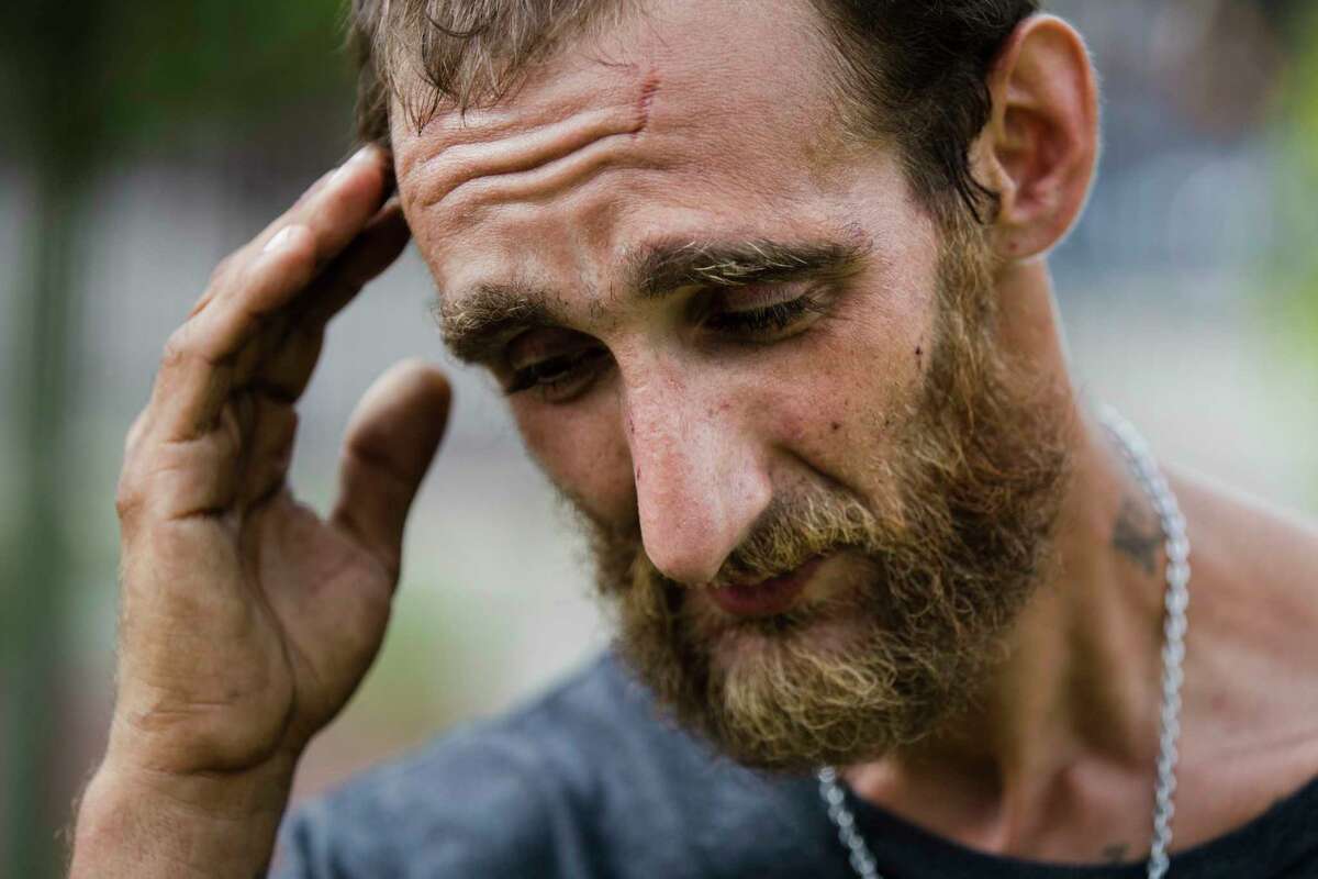 In this Monday, July 24, 2017 photo, Steven Kemp, who is addicted to heroin and is homeless, speaks with The Associated Press after meeting with a Philly Restart representative for help to obtain an identification card in Philadelphia. As an opioid epidemic ravages the nation, small but vulnerable populations of homeless people who are seeking respite from their addictions are sometimes turned away from the country's already threadbare system of drug treatment centers because they do not have valid photo identification (AP Photo/Matt Rourke)