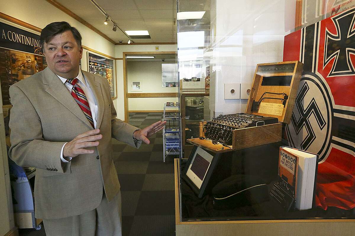 Staff historian Gabriel Marshall talks about a Nazi Germany Enigma coding machine that is on display at the Heritage Center of the U.S. Air Force Intelligence Surveillance Reconnaissance Agency at Lackland Air Force Security Hill in 2015. Also on display are U.S. SIGABA and Russian Fialka coding machines.