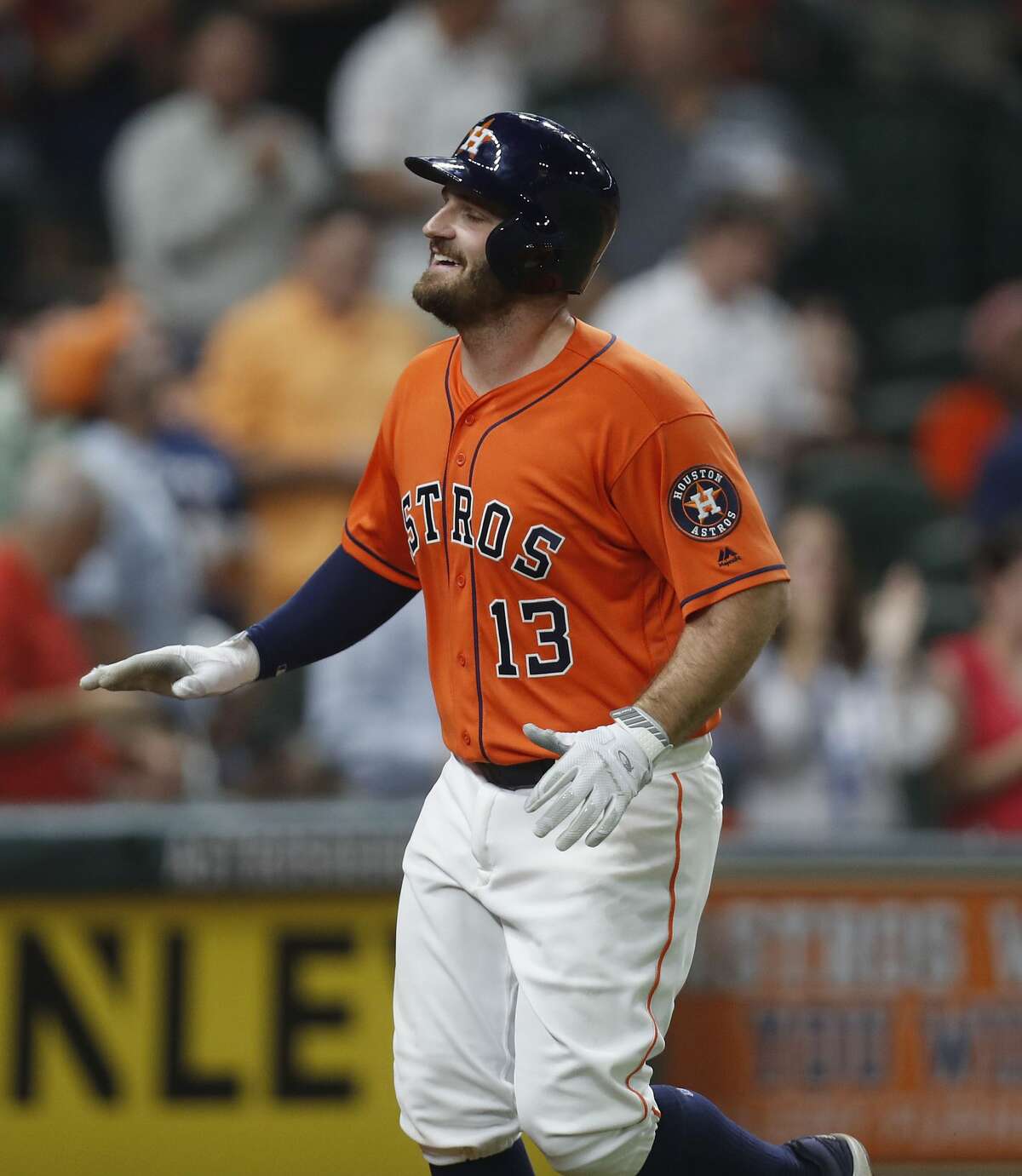 Houston Astros Tyler White (13) smiles as he crosses home plate after hitting his second home run of the night during the eighth inning of an MLB game at Minute Maid Park, Friday, Aug. 4, 2017, in Houston. ( Karen Warren / Houston Chronicle )