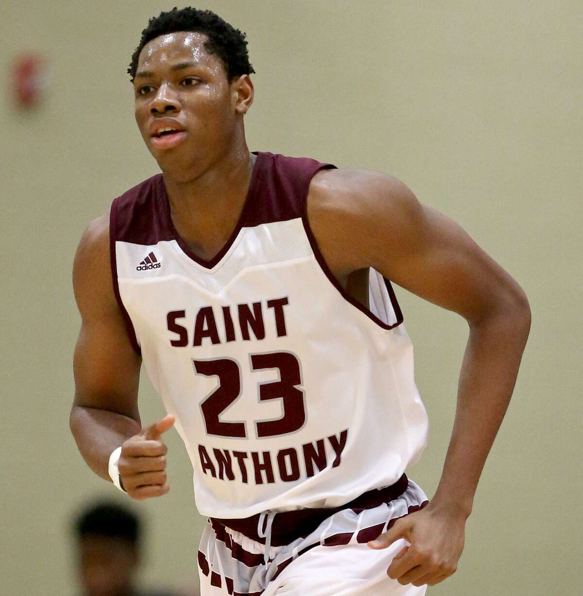 St. Anthony’s Charles Bassey heads up court against Southwest Christian on Jan. 21, 2017 at Athlos Leadership Academy in San Antonio.