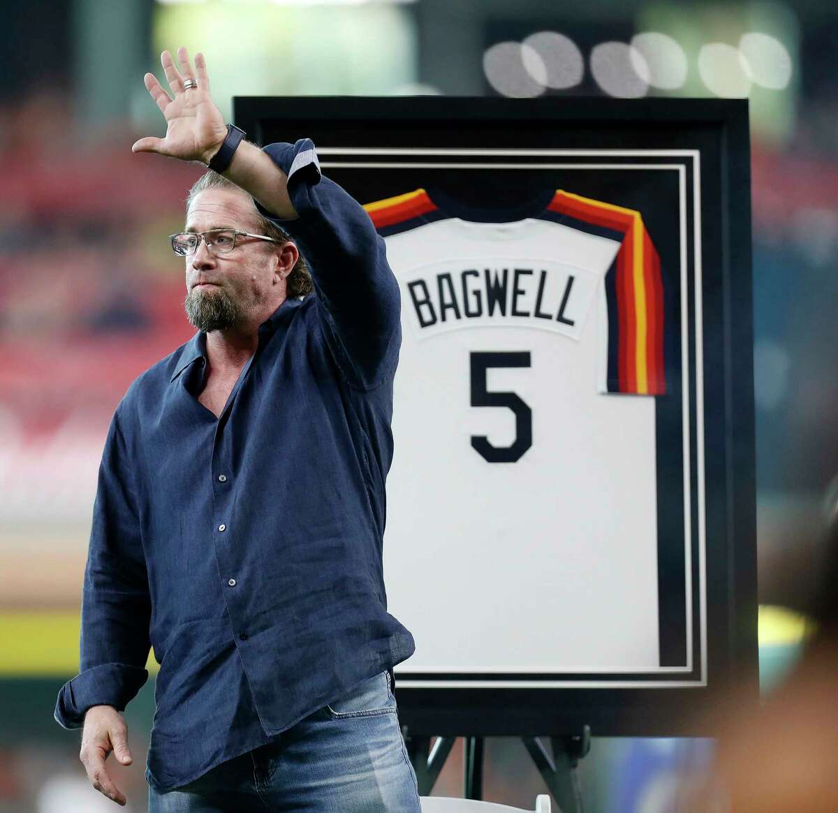 Jeff Bagwell waves to fans during a ceremony to honor his recent induction into the National Baseball Hall of Fame before the start of an MLB game at Minute Maid Park, Saturday, Aug. 5, 2017, in Houston.