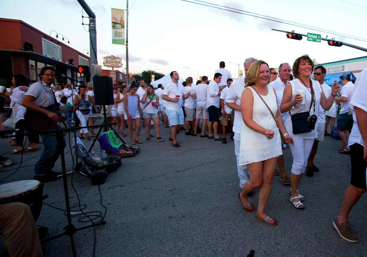 Houstonians come out for White Linen Night in the Heights