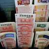 Powerball tickets at the Bonjour Food Store on Yale Street, Tuesday, Jan. 12, 2016, in Houston. ( Mark Mulligan / Houston Chronicle )
