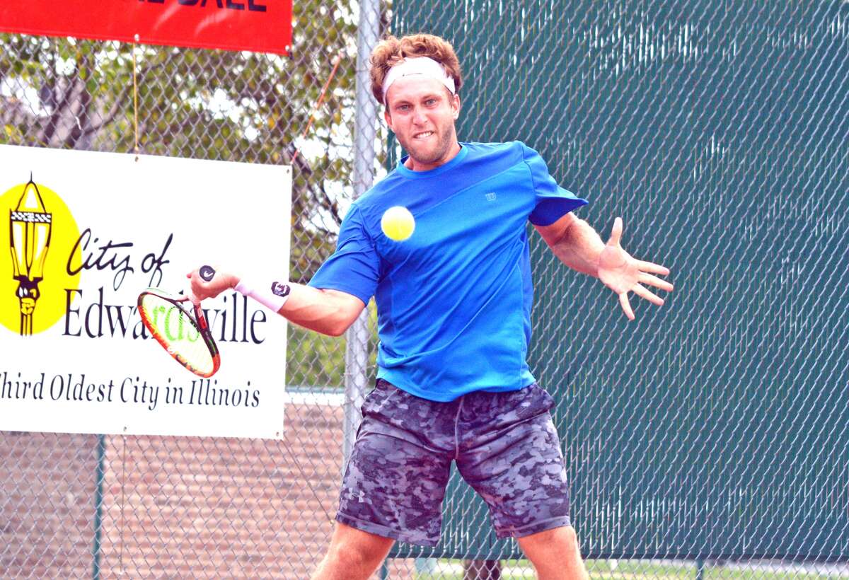 Gabriel Friedrich makes a forehand return on Monday during his match against Alfredo Perez in the final day of the USTA Edwardsville Futures qualifier.