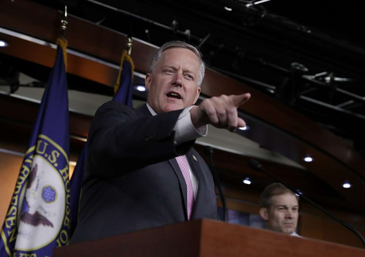 House Freedom Caucus Chairman Rep. Mark Meadows, R-N.C. speaks during a news conference on Capitol Hill in Washington, Wednesday, July 12, 2017, to say that his group wants to delay the traditional August recess until work is accomplished on health care, the debt ceiling and tax reform. (AP Photo/J. Scott Applewhite)