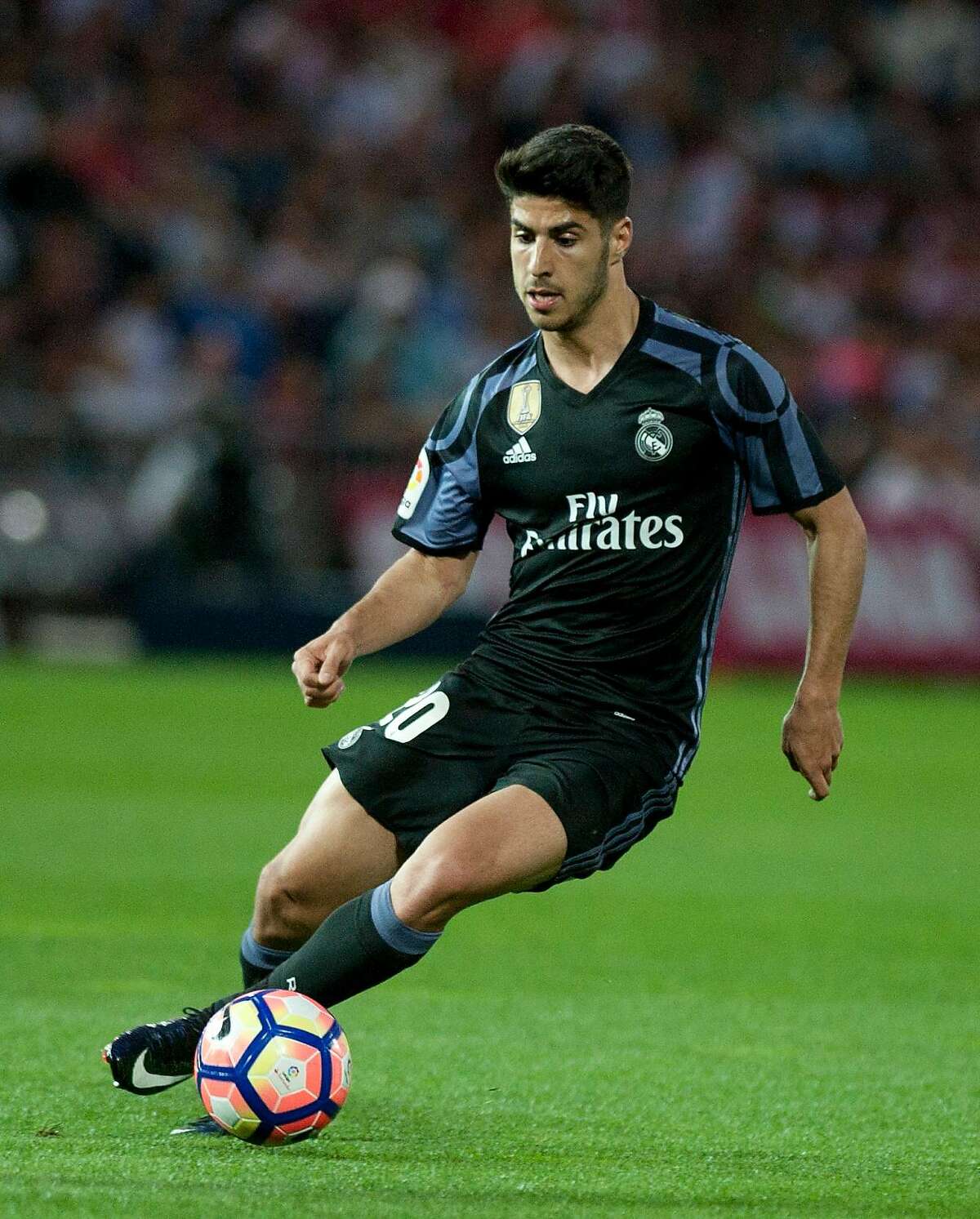 (FILES) This file photo taken on May 06, 2017 shows Real Madrid's forward Alvaro Morata controls the ball during the Spanish league football match Granada FC vs Real Madrid CF at Nuevo Los Carmenes stadium in Granada. Premier League champions Chelsea completed the signing of Real Madrid striker Alvaro Morata on a five-year-deal on July 21, 2017, in a deal reported to be worth 80 million euros. / AFP PHOTO / SERGIO CAMACHOSERGIO CAMACHO/AFP/Getty Images