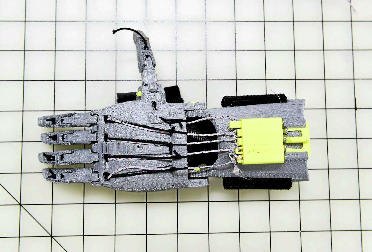 (Peter Hvizdak - New Haven Register)West Haven, Connecticut: May 7, 2017. A functional mechanical prosthetic of a hand made by a 3D printer.