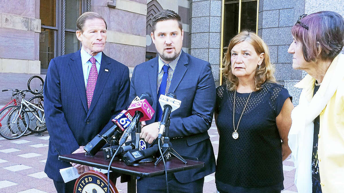 (Wes Duplantier/The New Haven Register)Speaking Monday near the federal courthouse in New Haven, U.S. Sen. Richard Blumenthal, D-Conn., and U.S. Congresswoman Rosa DeLauro, D-3, called on President Barack Obama to sign legislation to allow the families of 9/11 victims to sue foreign actors. They were joined by Brett and Gail Eagleson, the son and wife of Bruce Eagleson, who died in the attacks.
