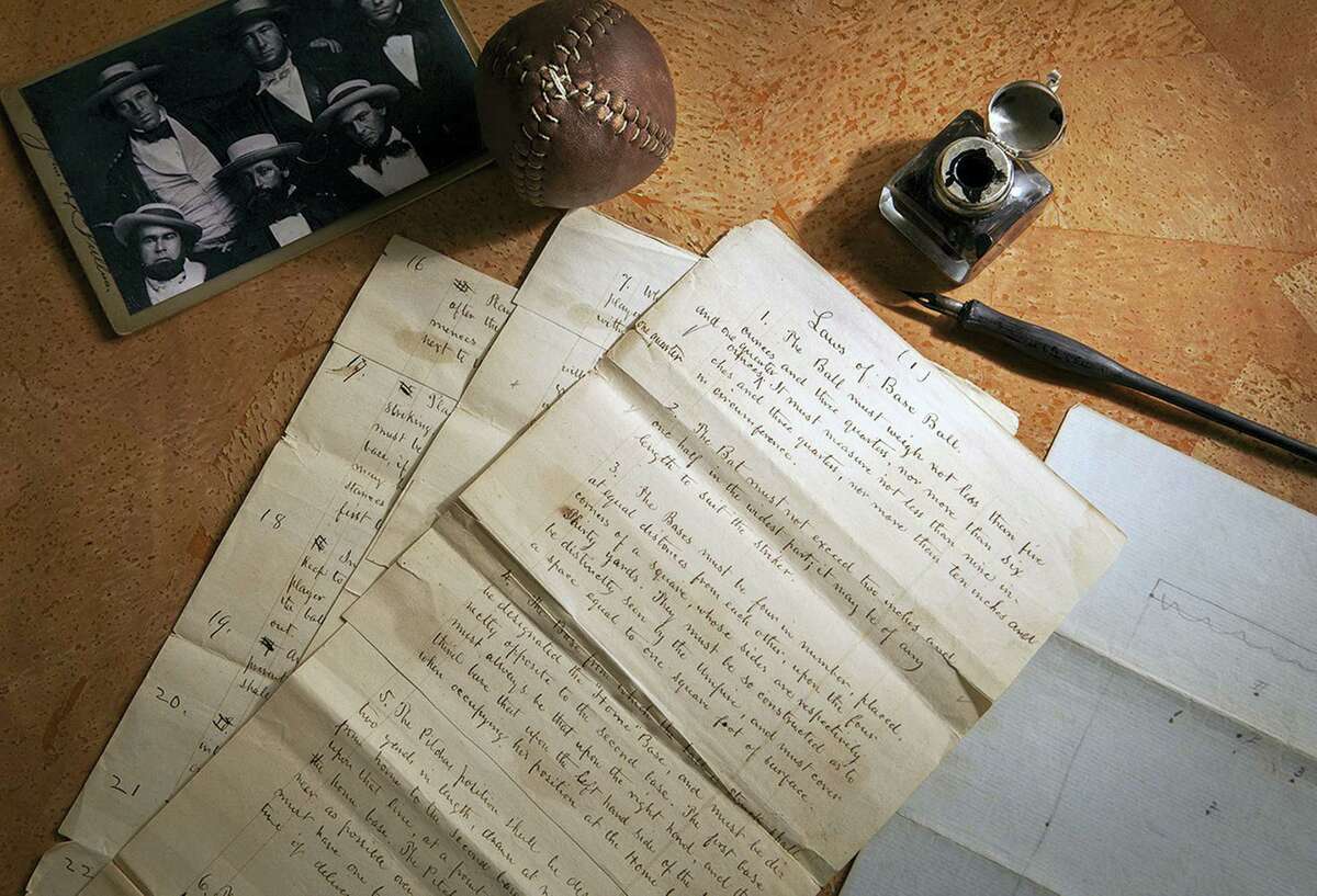 This Feb. 11, 2016 photo provided by SCP Auctions shows the 1857 documents titled “Laws of Base Ball.” Baseball may have found its birth certificate. And with it a new birth date, and new founding father. Coinciding with the start of the professional baseball season, a set of game-changing documents went up for sale this week. Their authenticity and significance are verified by experts including John Thorn, Major League Baseball’s official historian. (Leslie Larsen Bird/SCP Auctions via AP)