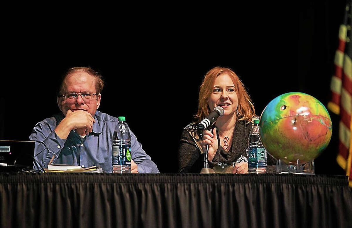 Jennifer Stern, a NASA space scientist who is an expert on Mars, talks about the Red Planet during an astronomy forum Monday at Southern Connecticut State University. Also pictured is James Fullmer, SCSU associate professor of earth science, who served as a panelist. The program, which attracted about 650 people – including 450 high school students – featured a look at Mars and NASA’s Kepler Mission. Among the high schools represented were Derby, North Haven, East Haven, Amity, Hillhouse, Stratford, Lyman Hall of Wallingford, Hand of Madison and Morgan of Clinton.
