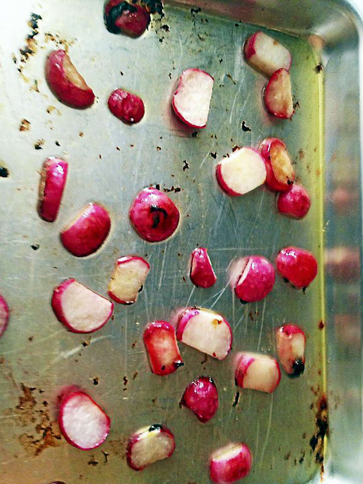 Not everyone likes radishes, but to cut the spice, try slicing thin and roasting with olive oil and honey. It's quite the treat! (Anna Bisaro - New Haven Register)