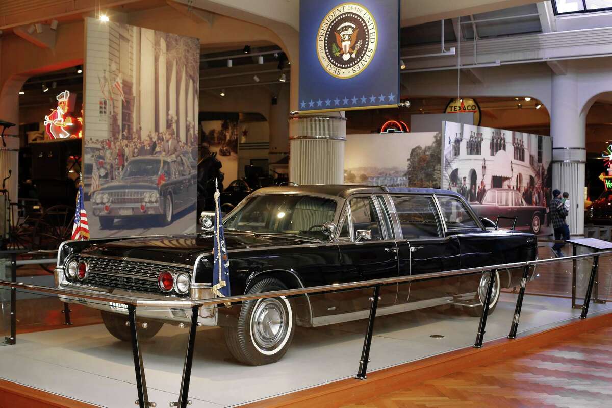 The limousine President John F. Kennedy was riding in when he was fatally shot in Dallas is shown on display at The Henry Ford Museum in Dearborn, Mich., March 23, 2015. Taking in the final moments of some important American lives is a major draw to the museum. Museum officials say they are among the most visited artifacts in the museum, along with the bus Rosa Parks rode in when she refused to give up her seat to a white rider and helped spark the civil rights movement and Lincolnís chair from Fordís Theatre in Washington, D.C. (AP Photo/Paul Sancya)