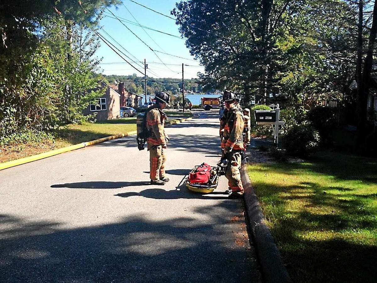 (Cassandra Day -- Middletown Press) Firefighters were on the scene of a house fire involving a propane tank explosion at a home on Ola Avenue, near Lake Pocotopaug.