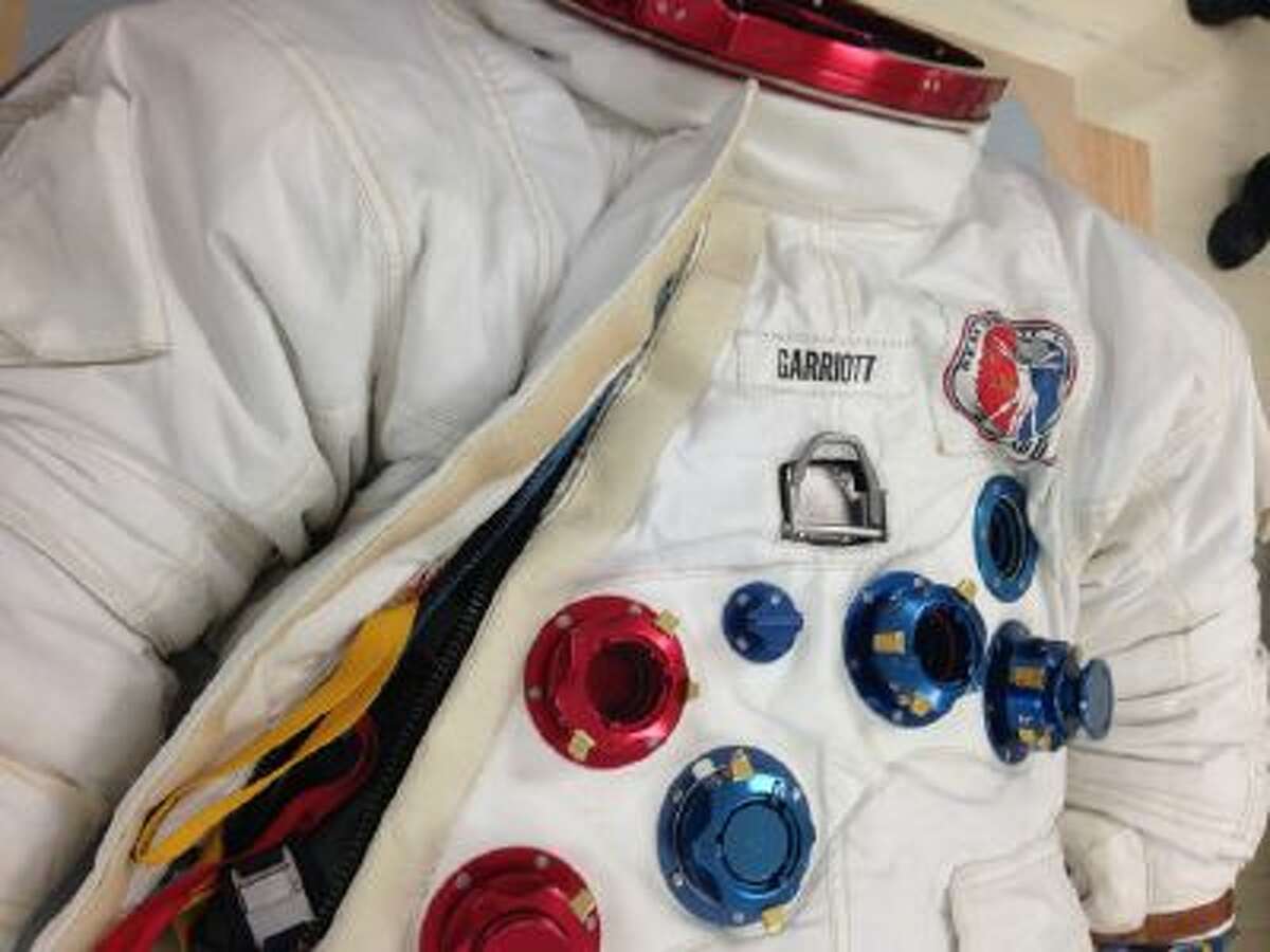 Close up of spacesuit worn by astronaut Owen Garriott on the Skylab space station seen at the National Air and Space Museum's Udvar-Hazy Center in Chantilly, Va.